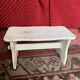 Country footrest in white patinated wood.