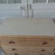 Vintage oak chest of drawers, a travertine plate laid for tray.