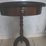 Pedestal table in mahogany style opening through a drawer