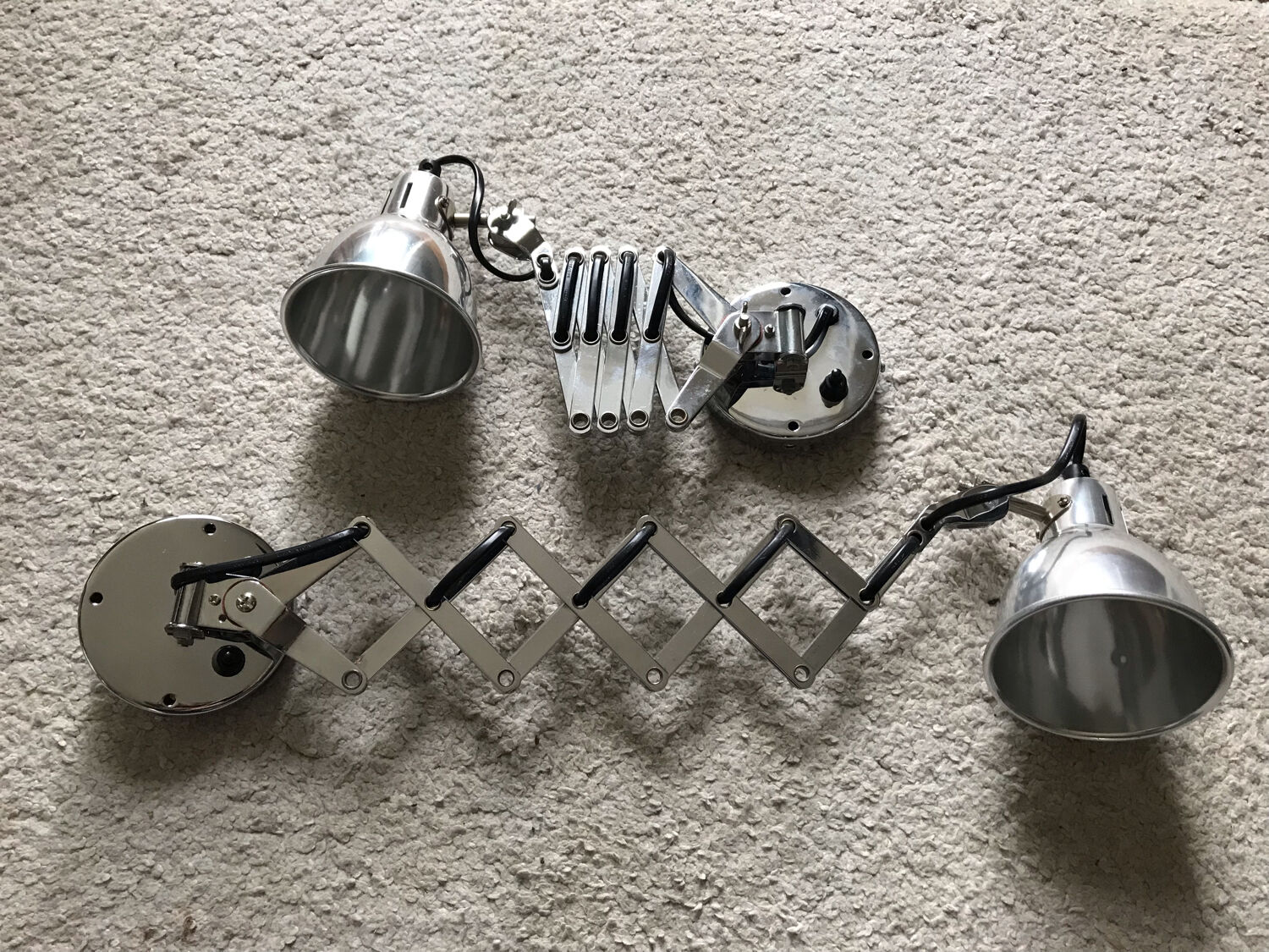 Stainless steel articulated wall lamps