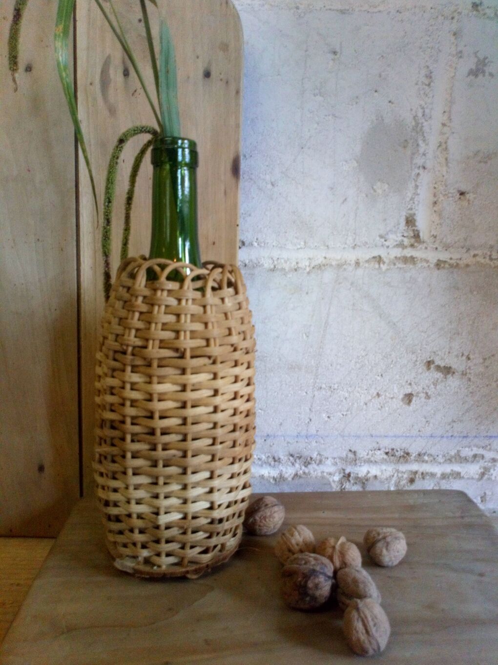 Bottle in a rattan basketry 50s