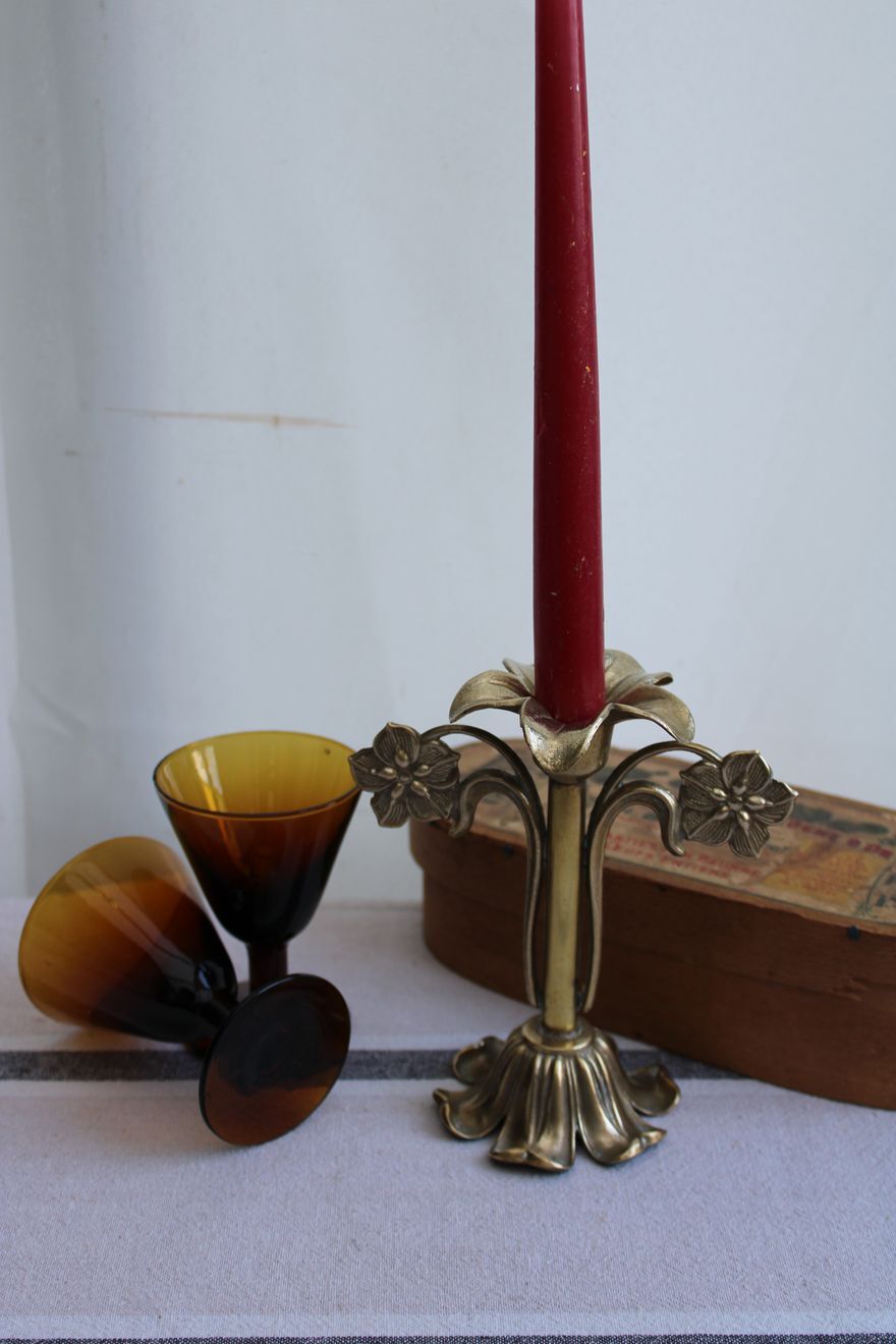 Golden metal stand candle holder
