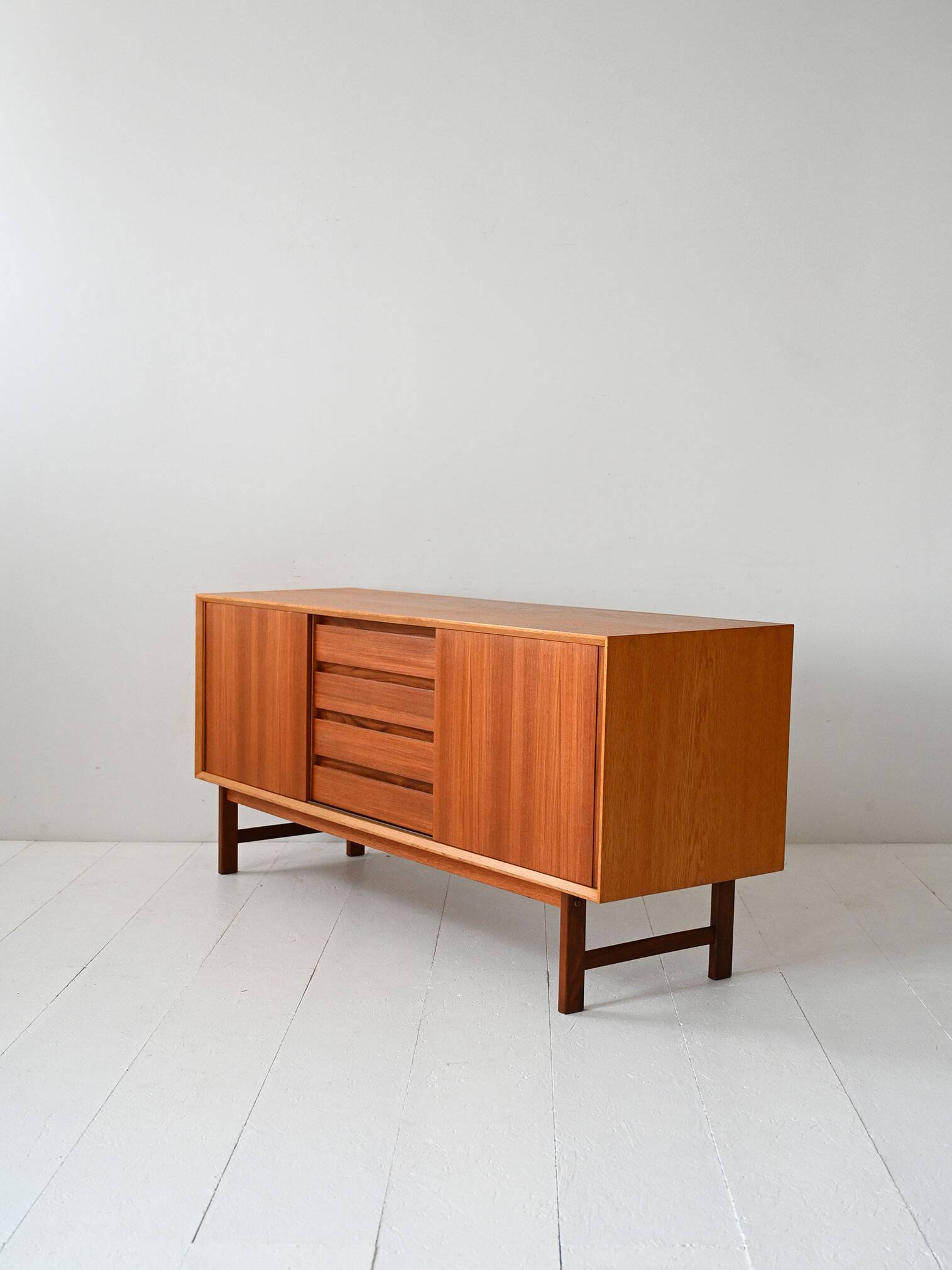 Vintage Scandinavian teak sideboard with metal-lined drawers