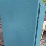 Asymmetrical changing table cabinet