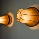 Pair of pear-shaped "cocoon" wall lights, resin and pine, Italy, 1970