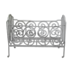 Old white wrought iron child bed