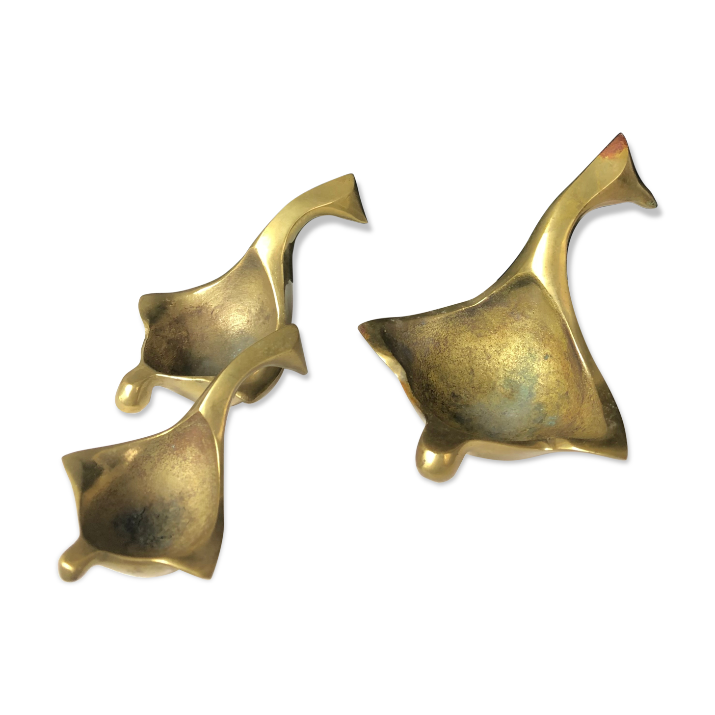 Suite of bronze "swan" ashtrays