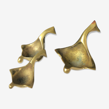 Suite of bronze "swan" ashtrays