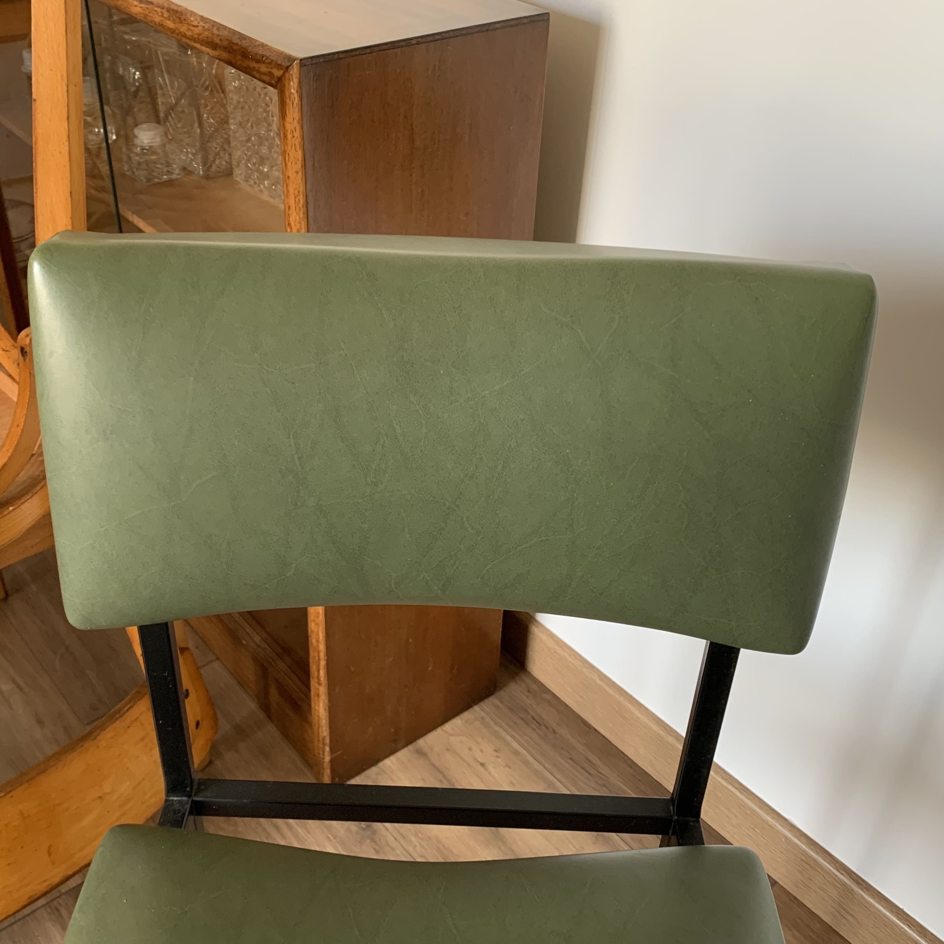 green and metal skai chair