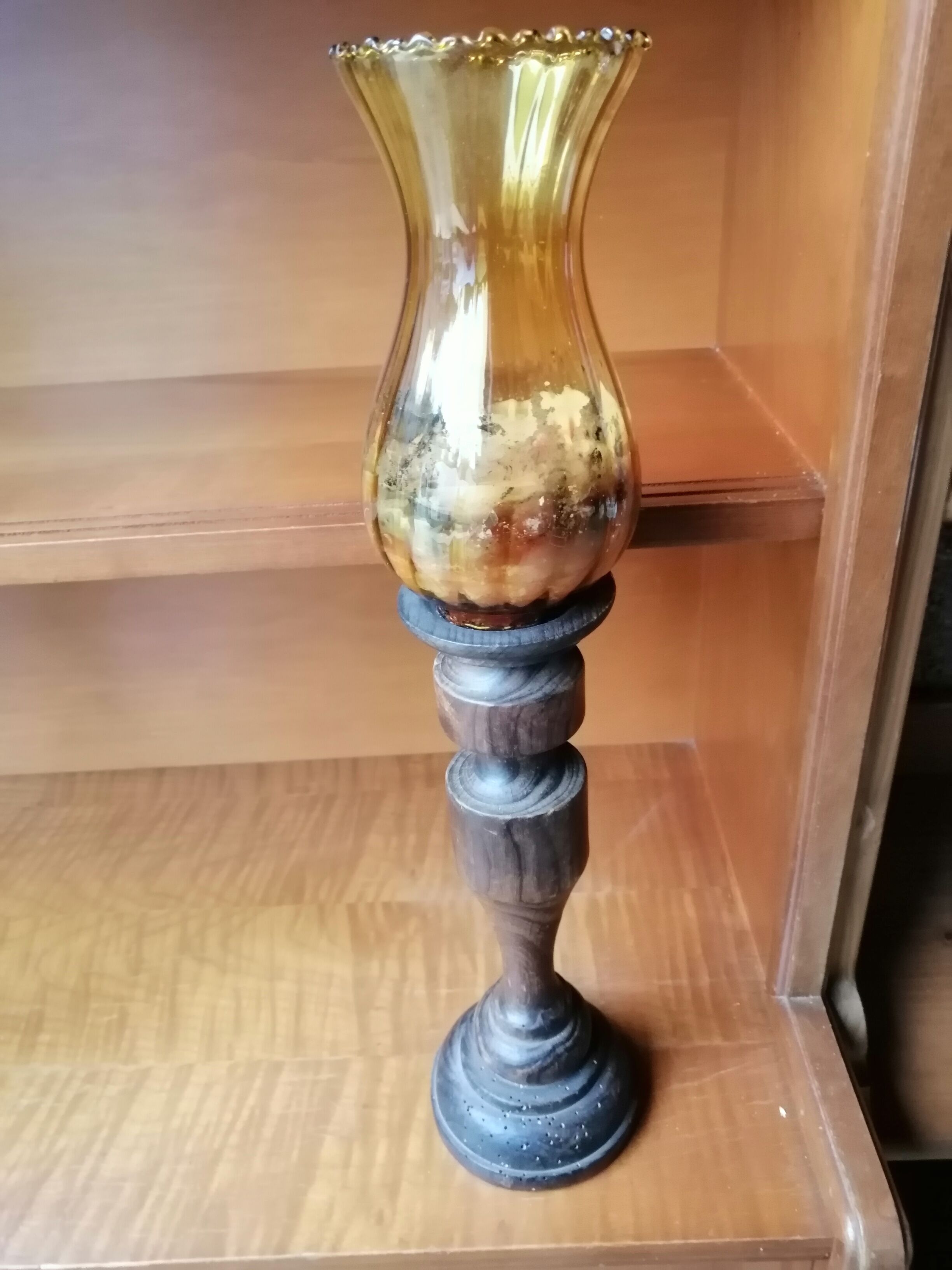 Pair of wooden candle holders and antique glass