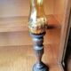 Pair of wooden candle holders and antique glass