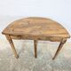 Half-moon table in walnut