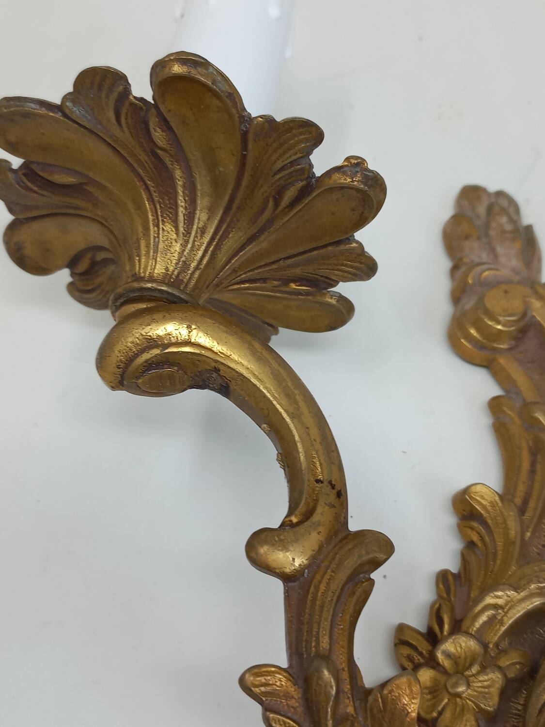 Pair of Louis XV style two-light bronze wall sconces