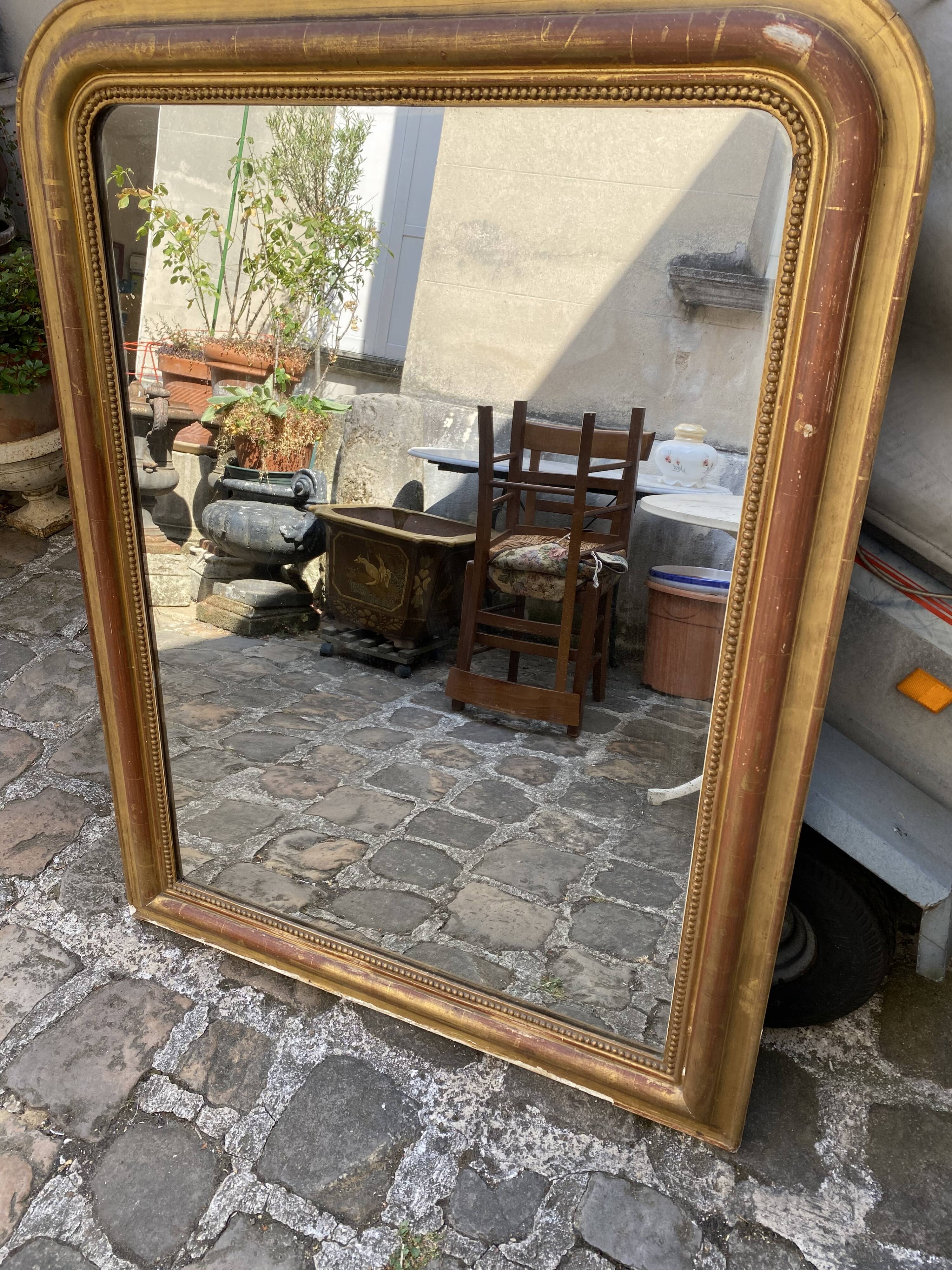 Beautiful early 20th-century fireplace mirror.