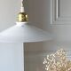 Suspension in opaline