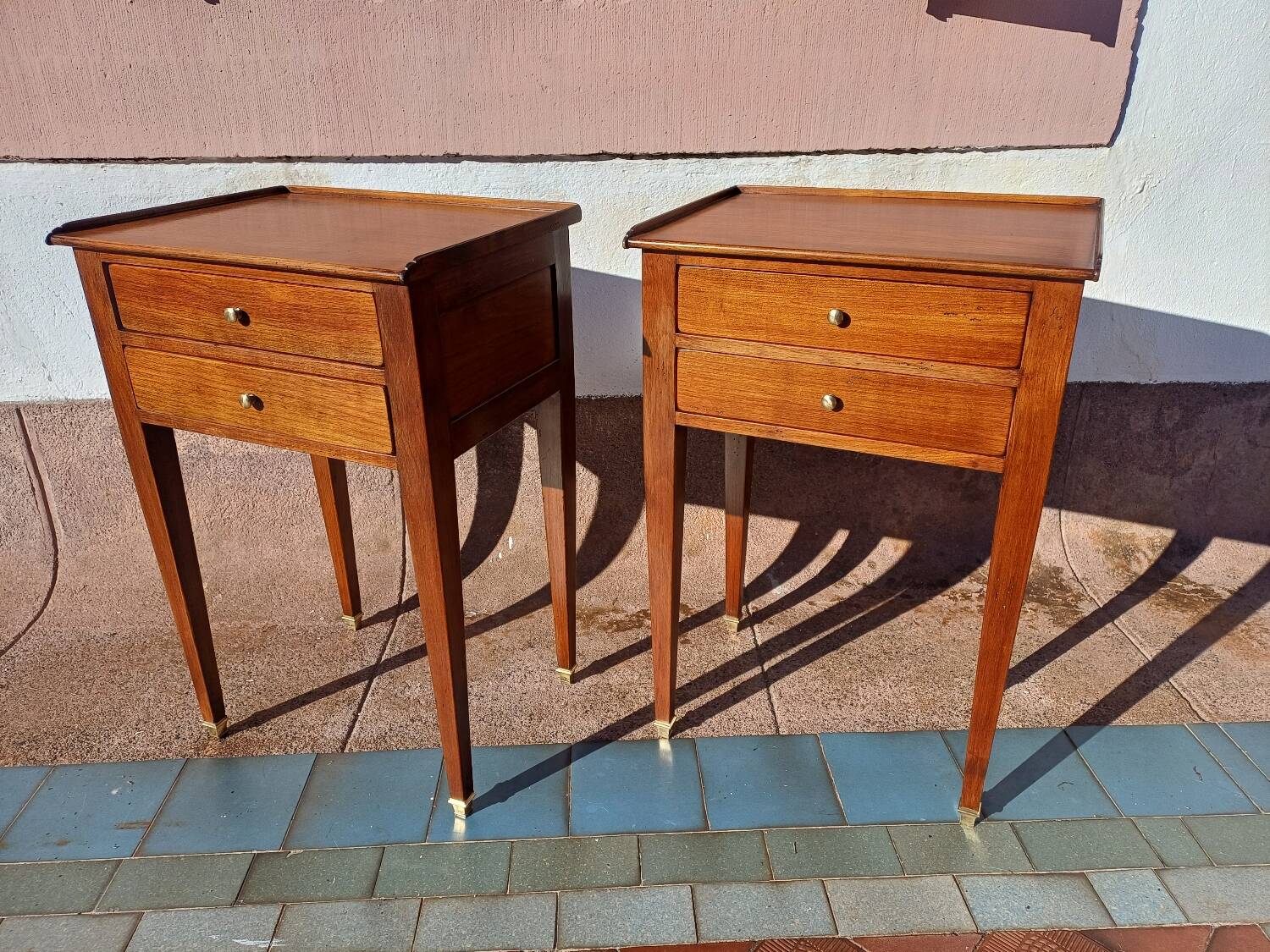 Pair of Louis XVI style oak bedside tables with 2 drawers and spindle legs