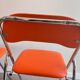 Chaises pliantes vintage chrome / skaï orange Soudexvinyl