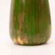 Art Deco porcelain vase in green with floral patterns.