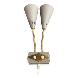 Applique double métal