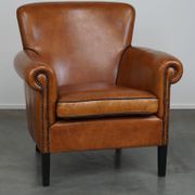 Fauteuil en cuir de mouton à l'aspect luxueux
