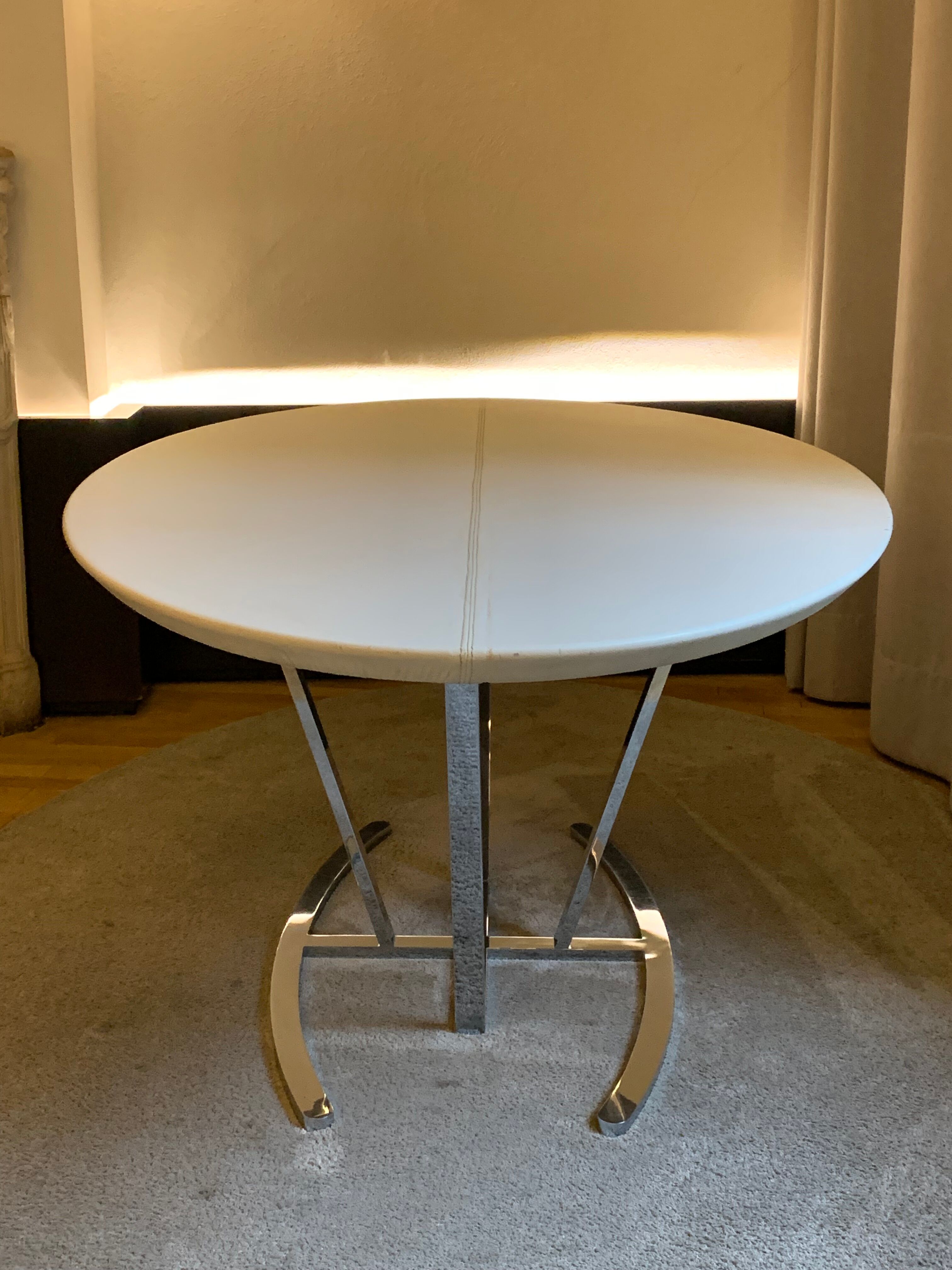 Oval tables white leather and stainless steel matrix with central stitching