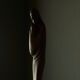 Sculpture of a woman and child in hand-carved wood, mid-20th century.