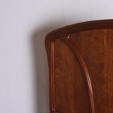 Wooden bed, early 20th century.