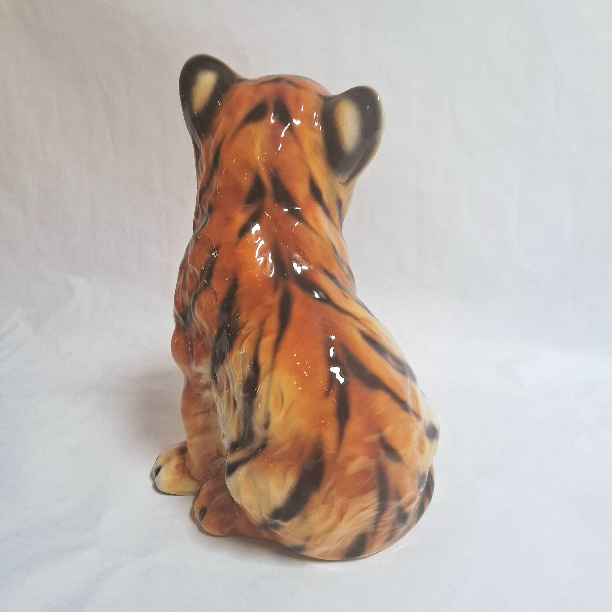 Vintage animal sculpture in Italian ceramic depicting a tiger cub.