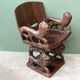 Siège africain monoxyle en bois sculpté