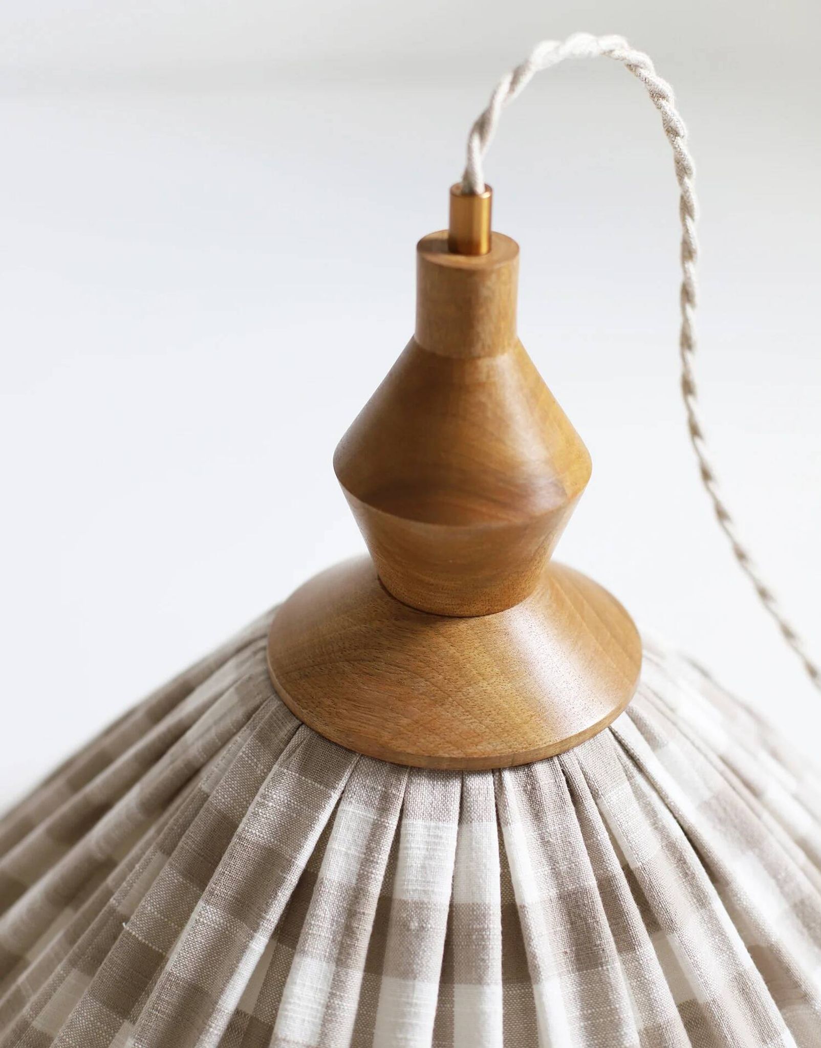 "Olga" pleated pendant light in beige checked fabric and turned wood finish
