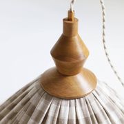 "Olga" pleated pendant light in beige checked fabric and turned wood finish