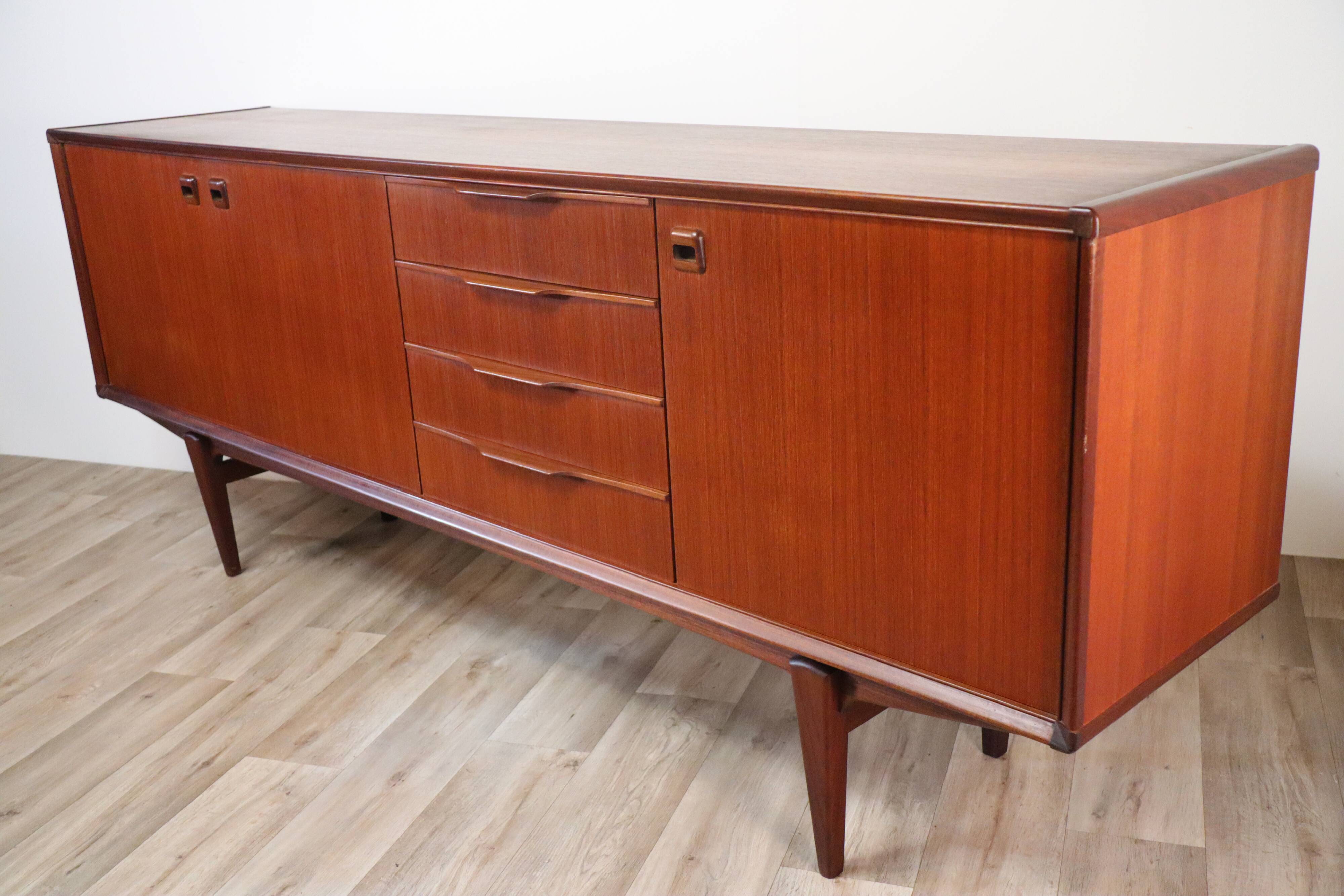 Scandinavian row in solid teak 1960