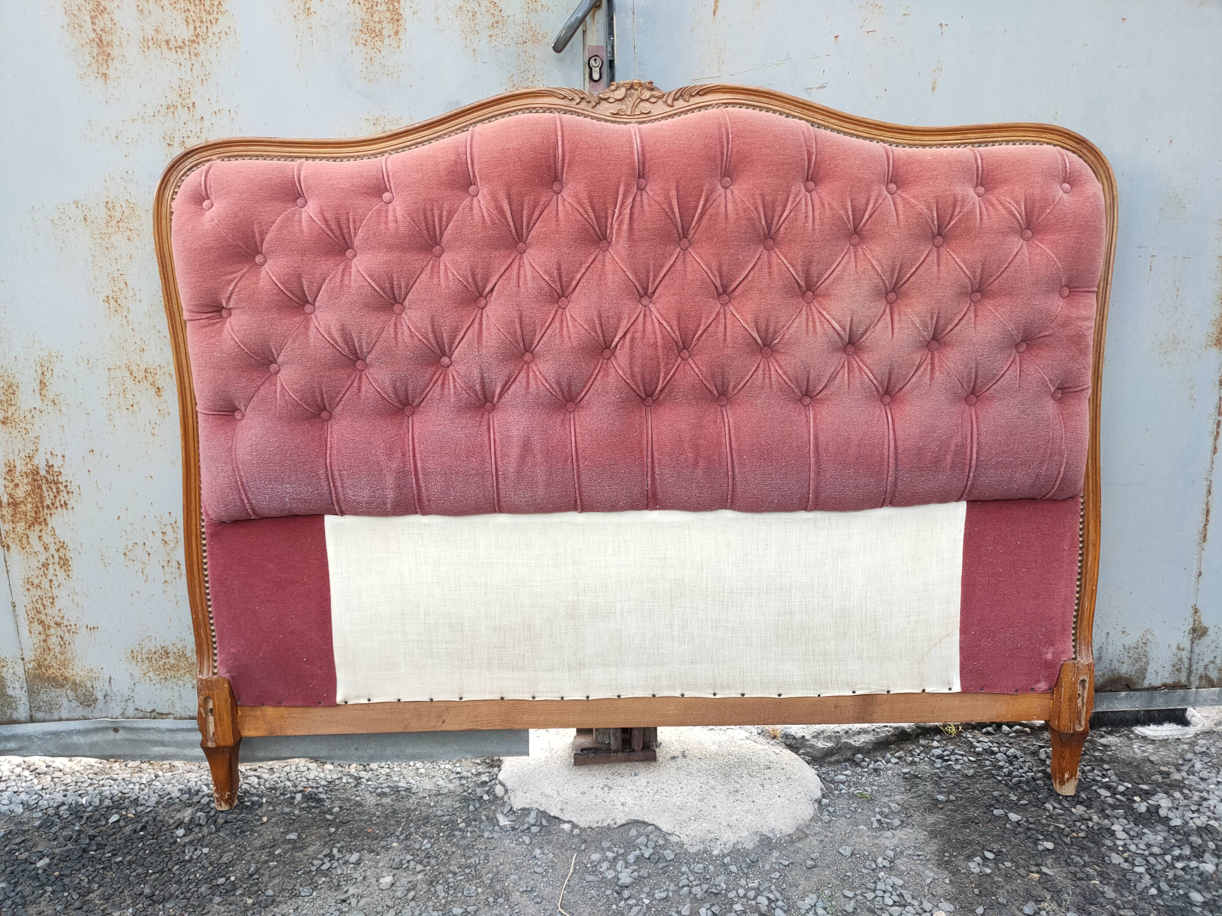 antique wooden and fabric headboard