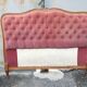 antique wooden and fabric headboard