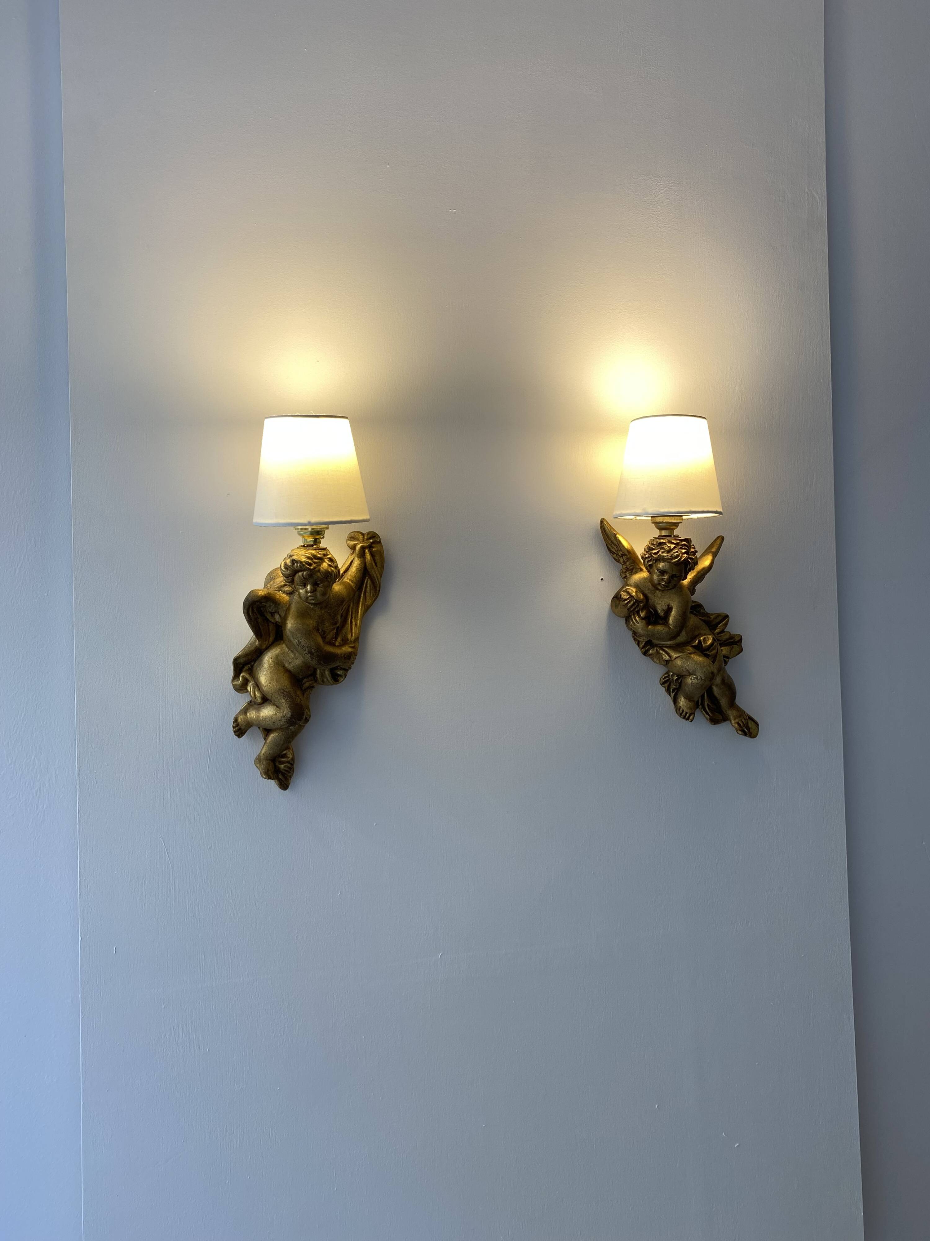 Pair of golden Puttis wall lights