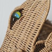 Vintage rattan frog magazine rack