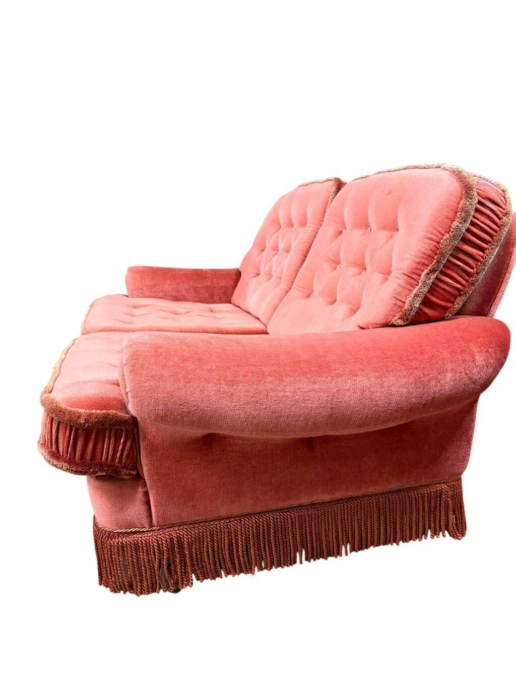 Vintage pink two-seater sofa with fringes