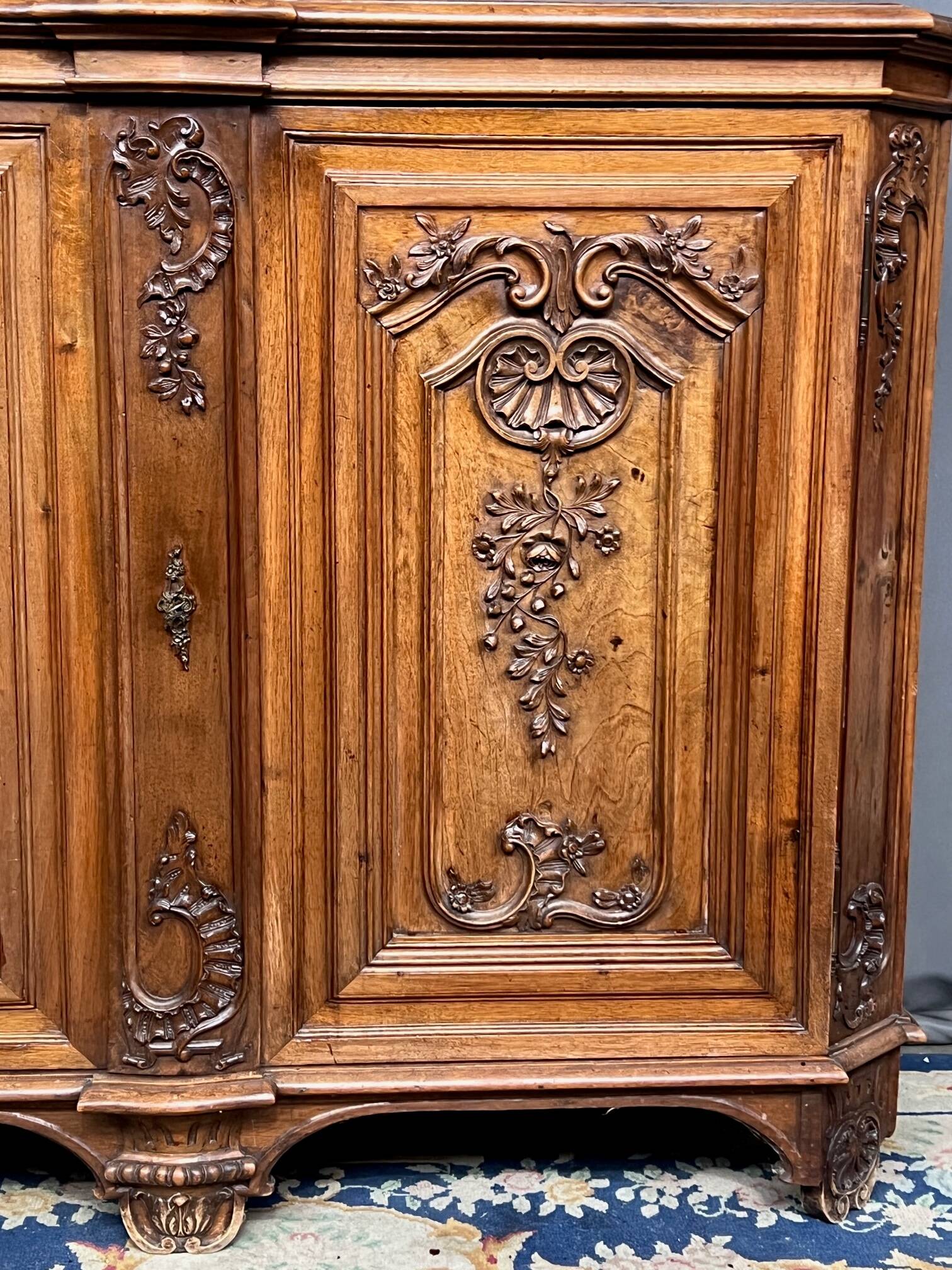 Louis XV style carved walnut chest of drawers
