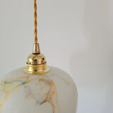 Marbled opaline suspension