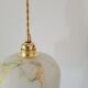 Marbled opaline suspension