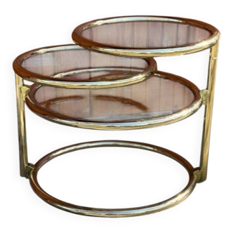 1970s swivel coffee table in gilded brass and glass, Milo Baughman style, vintage design.