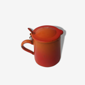 Orange glazed pitcher