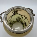 Old enameled glass cookie jar with mill decor