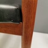 Danish designed footstool in teak wood and black skai “imitation leather”