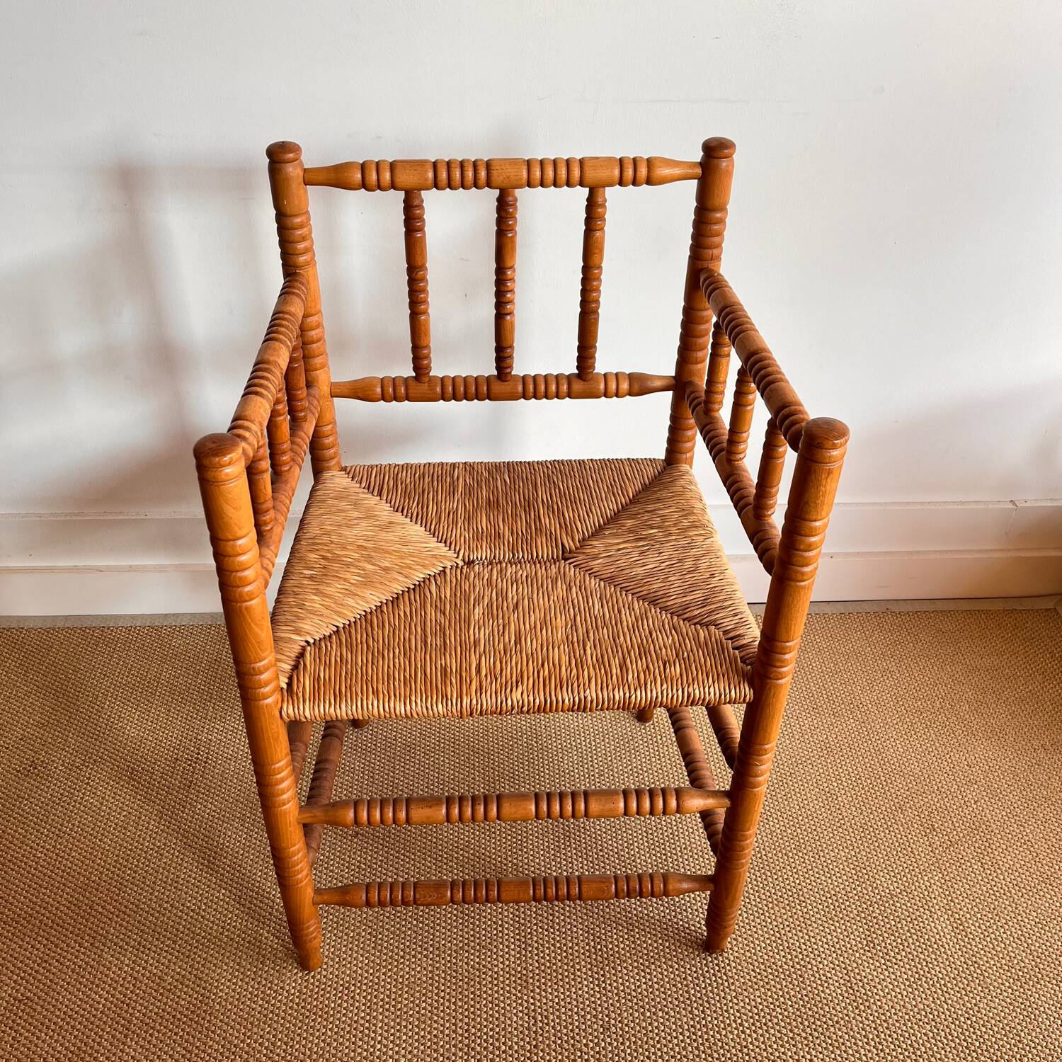 Antique Dutch bobbin chair with rush seating