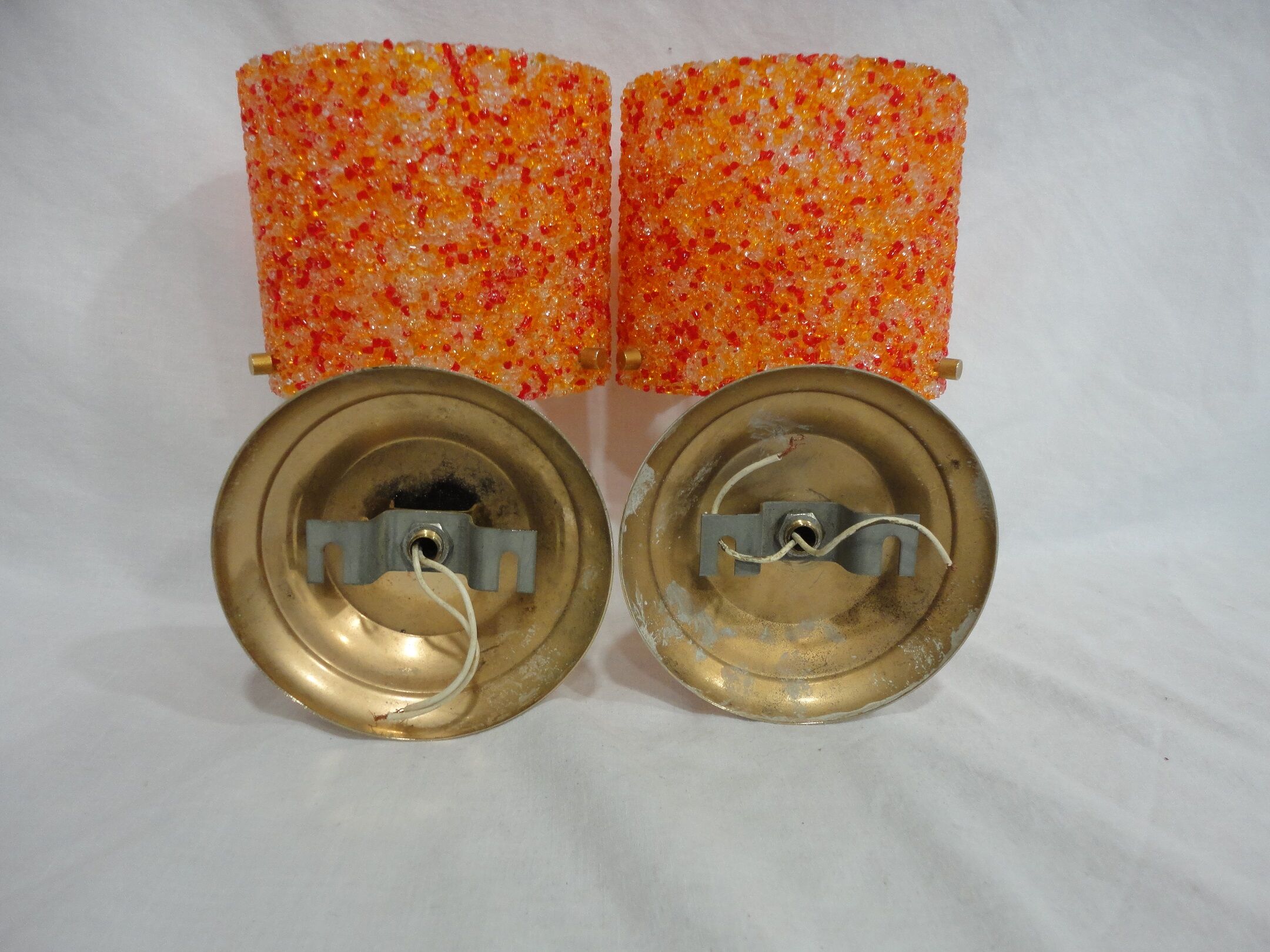 Pair of vintage applique in orange and brass perspex