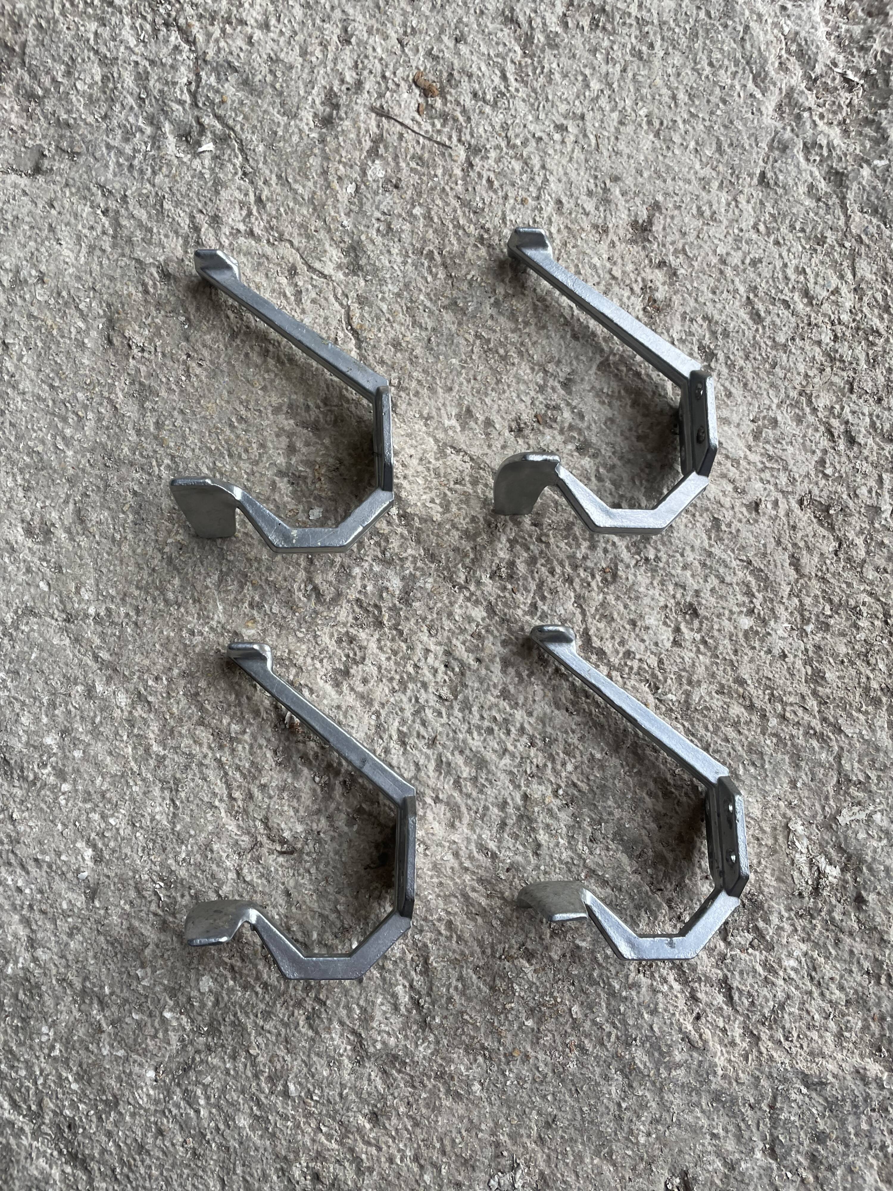 Set of 4 old metal coat hooks