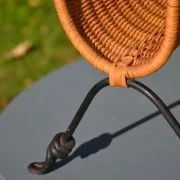 Wrought iron and rattan magazine/newspaper rack