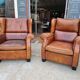 Paire de fauteuils club en cuir des années 1980