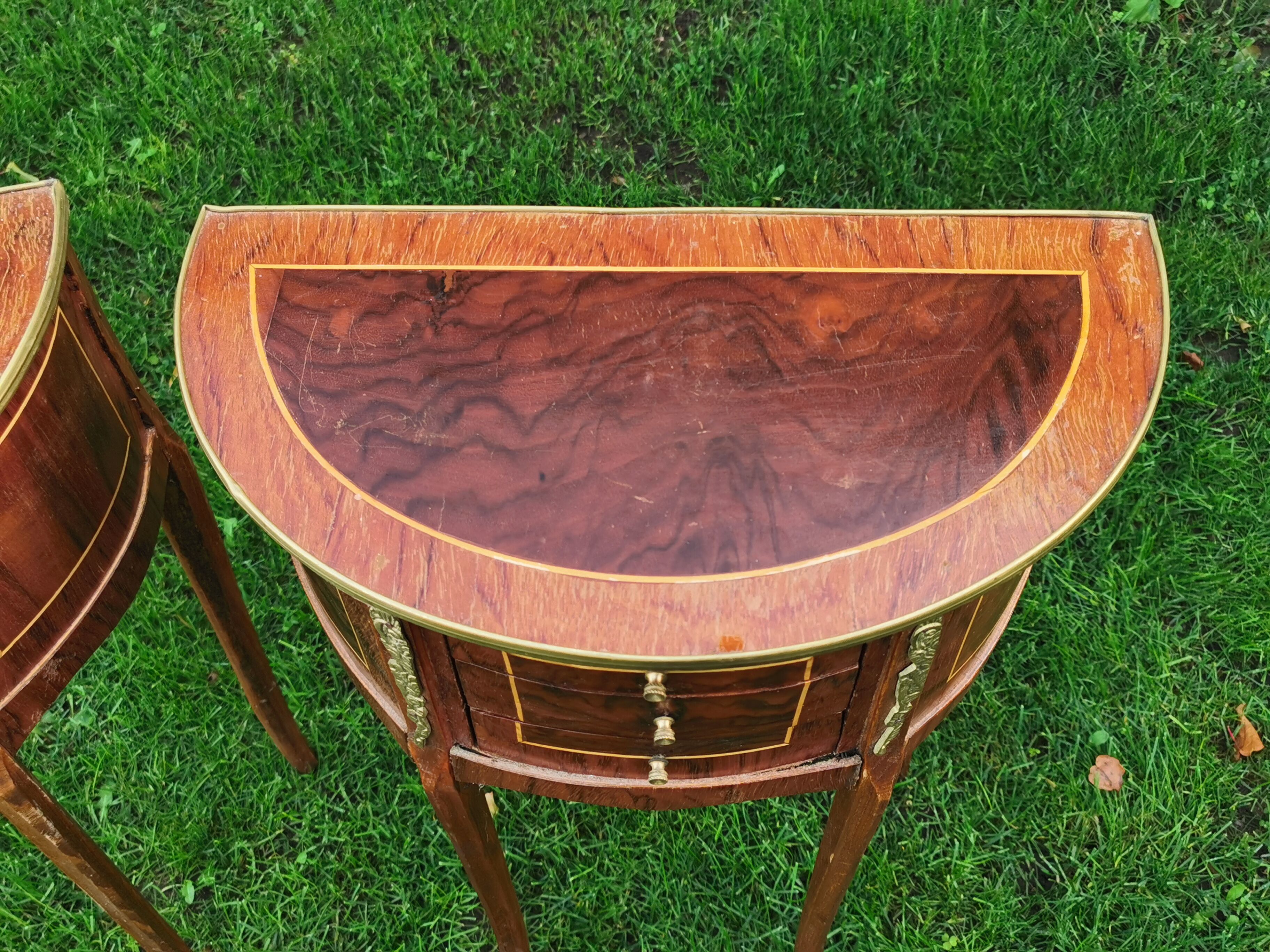 half-moon bedside pair in marquetry, bronze ornaments